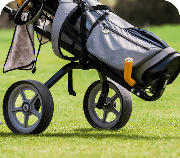 Push cart on green grass
