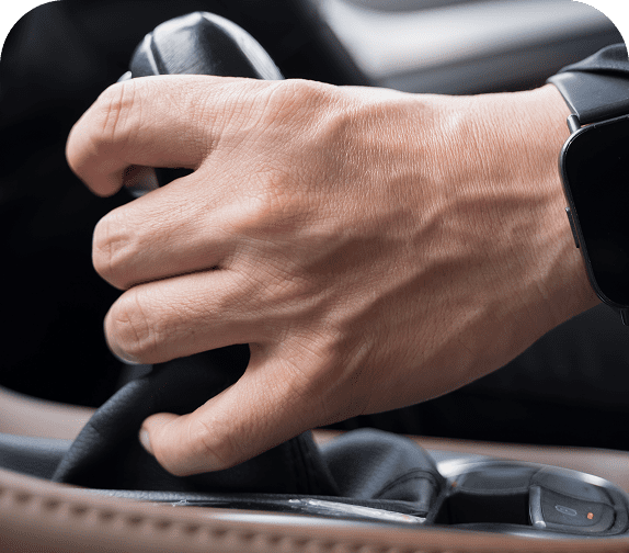 Driving with hand on gear stick