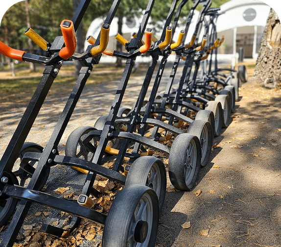 Parked go-karts under sunny sky